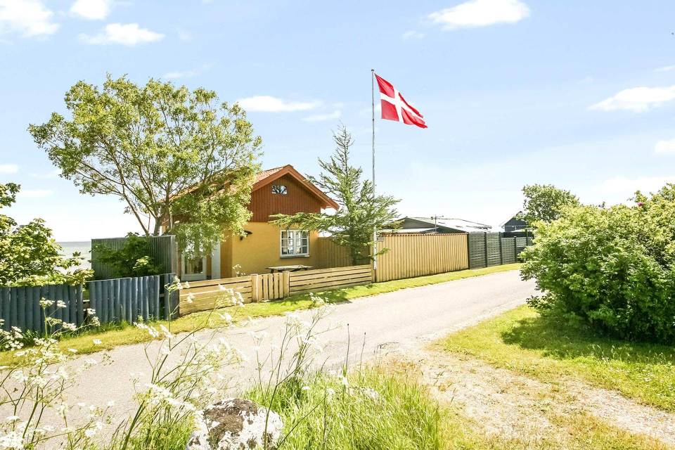 This tiny beachfront cottage in Denmark has 172 sq ft on the ground floor plus a sleeping loft. | www.facebook.com/SmallHouseBliss