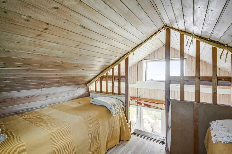 This tiny beachfront cottage in Denmark has 172 sq ft on the ground floor plus a sleeping loft. | www.facebook.com/SmallHouseBliss