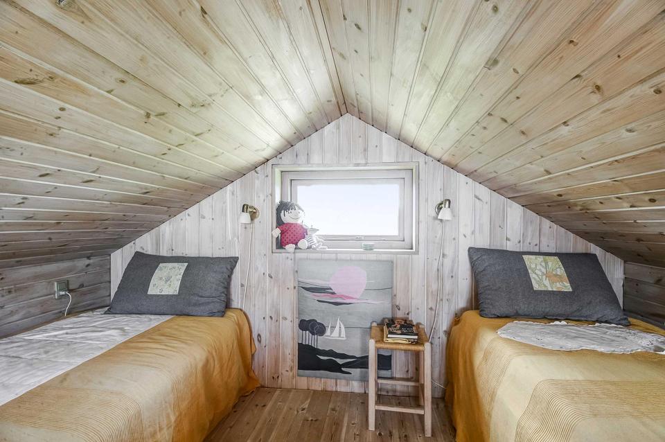 This tiny beachfront cottage in Denmark has 172 sq ft on the ground floor plus a sleeping loft. | www.facebook.com/SmallHouseBliss
