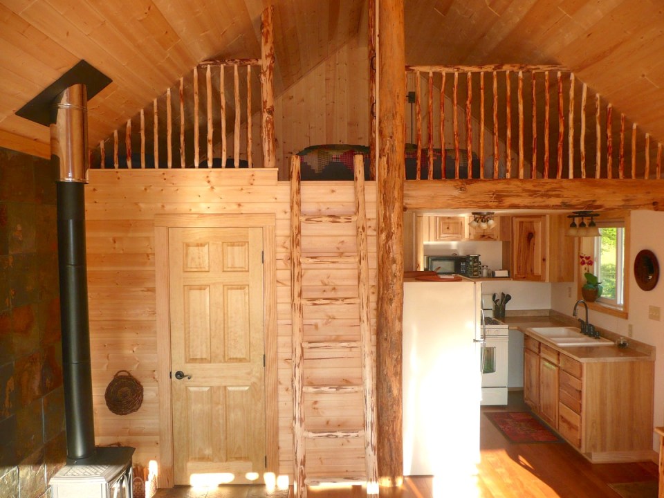 The Pond Cottage, a small cabin tucked into a secluded forest meadow. Inside it has 400 sq ft on the main floor plus a loft bedroom. | www.facebook.com/SmallHouseBliss