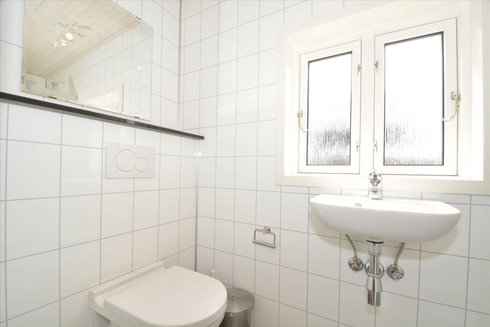 This Danish summerhouse was inspired by the neighboring fishermen's sheds. It has one bedroom on the 375 sq ft ground floor, plus a sleeping loft. | www.facebook.com/SmallHouseBliss