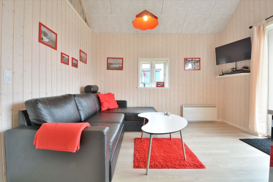 This Danish summerhouse was inspired by the neighboring fishermen's sheds. It has one bedroom on the 375 sq ft ground floor, plus a sleeping loft. | www.facebook.com/SmallHouseBliss