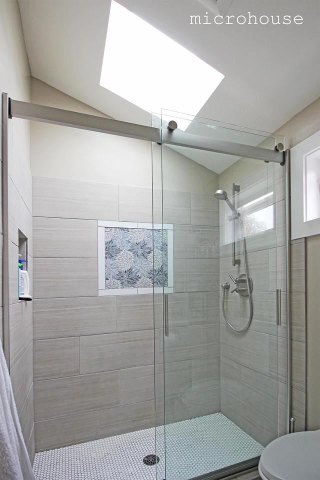 This contemporary backyard cottage in Seattle was designed to take advantage of natural light. It has one bedroom and a study in 800 sq ft. | www.facebook.com/SmallHouseBliss