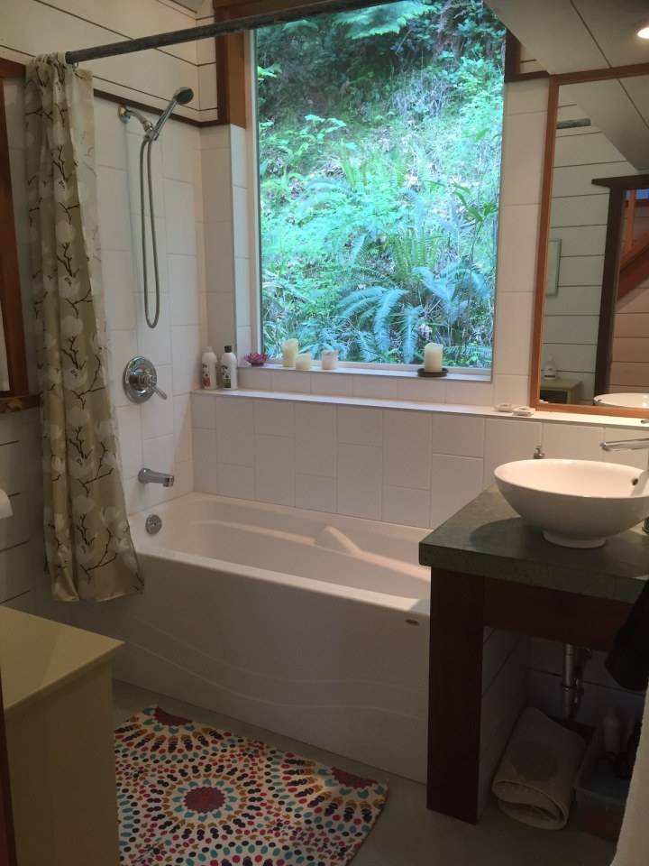 Birds' Hill Cottage is nestled in the rainforest on BC's Salt Spring Island. It has a ground-floor bedroom plus a large bedroom loft in roughly 800 sq ft. | www.facebook.com/SmallHouseBliss