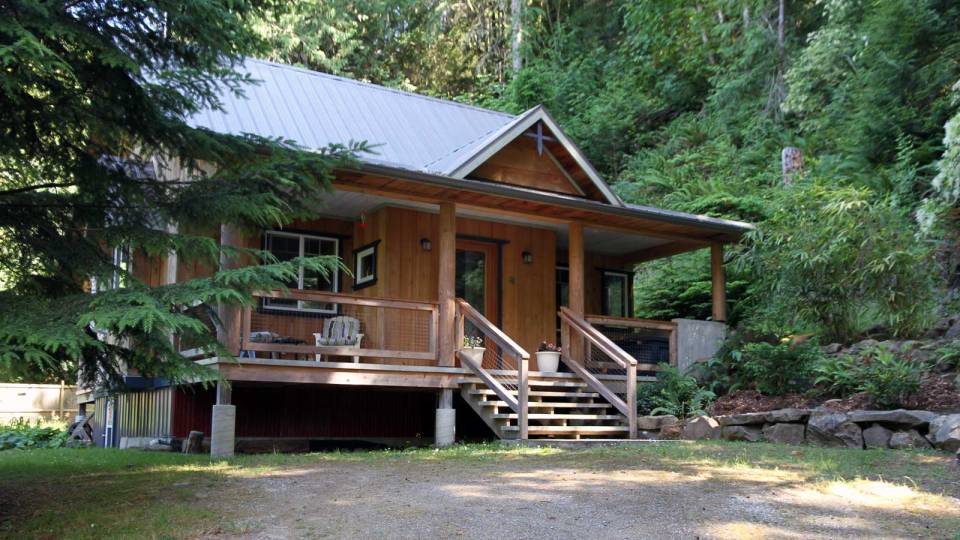 Birds' Hill Cottage is nestled in the rainforest on BC's Salt Spring Island. It has a ground-floor bedroom plus a large bedroom loft in roughly 800 sq ft. | www.facebook.com/SmallHouseBliss