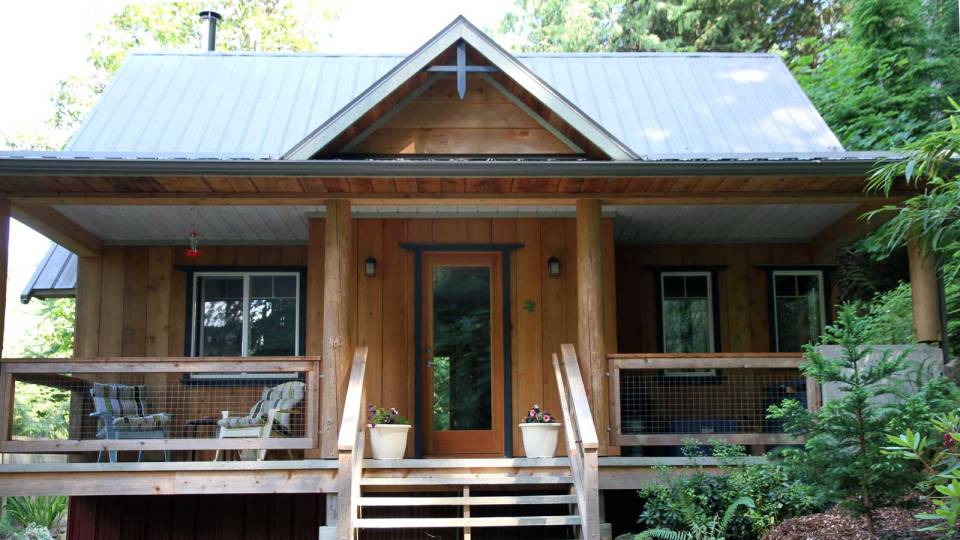 Birds' Hill Cottage is nestled in the rainforest on BC's Salt Spring Island. It has a ground-floor bedroom plus a large bedroom loft in roughly 800 sq ft. | www.facebook.com/SmallHouseBliss