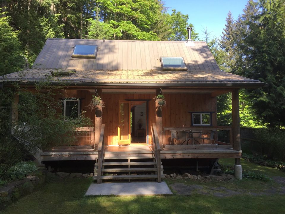 Birds' Hill Cottage is nestled in the rainforest on BC's Salt Spring Island. It has a ground-floor bedroom plus a large bedroom loft in roughly 800 sq ft. | www.facebook.com/SmallHouseBliss