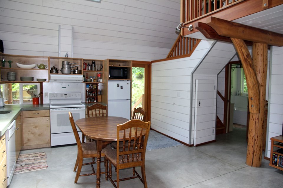 Birds' Hill Cottage is nestled in the rainforest on BC's Salt Spring Island. It has a ground-floor bedroom plus a large bedroom loft in roughly 800 sq ft. | www.facebook.com/SmallHouseBliss