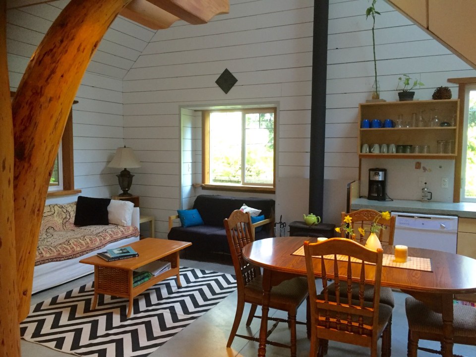 Birds' Hill Cottage is nestled in the rainforest on BC's Salt Spring Island. It has a ground-floor bedroom plus a large bedroom loft in roughly 800 sq ft. | www.facebook.com/SmallHouseBliss