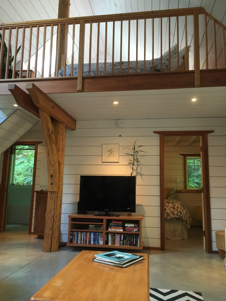 Birds' Hill Cottage is nestled in the rainforest on BC's Salt Spring Island. It has a ground-floor bedroom plus a large bedroom loft in roughly 800 sq ft. | www.facebook.com/SmallHouseBliss