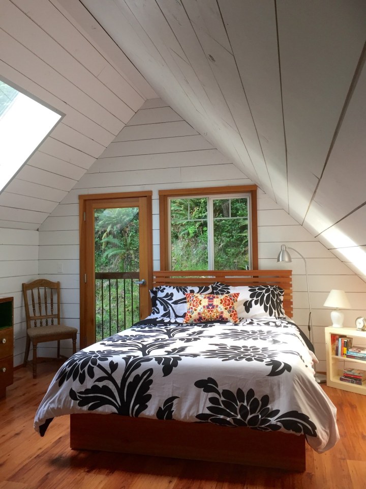 Birds' Hill Cottage is nestled in the rainforest on BC's Salt Spring Island. It has a ground-floor bedroom plus a large bedroom loft in roughly 800 sq ft. | www.facebook.com/SmallHouseBliss