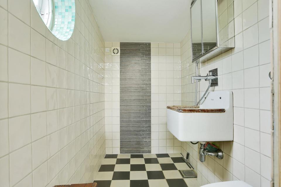 This fanciful allotment hut in Denmark has a tiny bedroom, a sleeping alcove and a sleeping loft in its 645 sq ft. | www.facebook.com/SmallHouseBliss