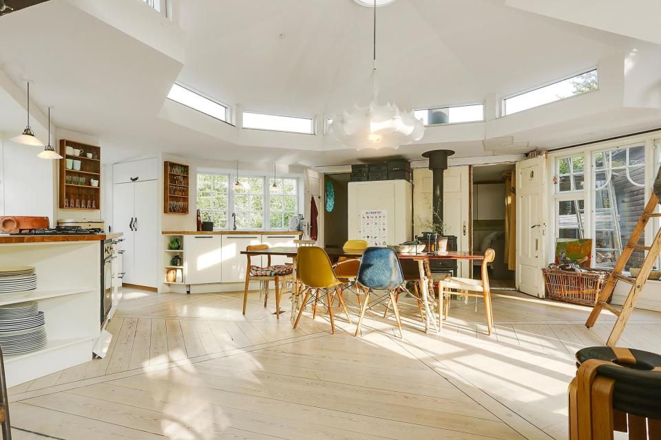 This fanciful allotment hut in Denmark has a tiny bedroom, a sleeping alcove and a sleeping loft in its 645 sq ft. | www.facebook.com/SmallHouseBliss