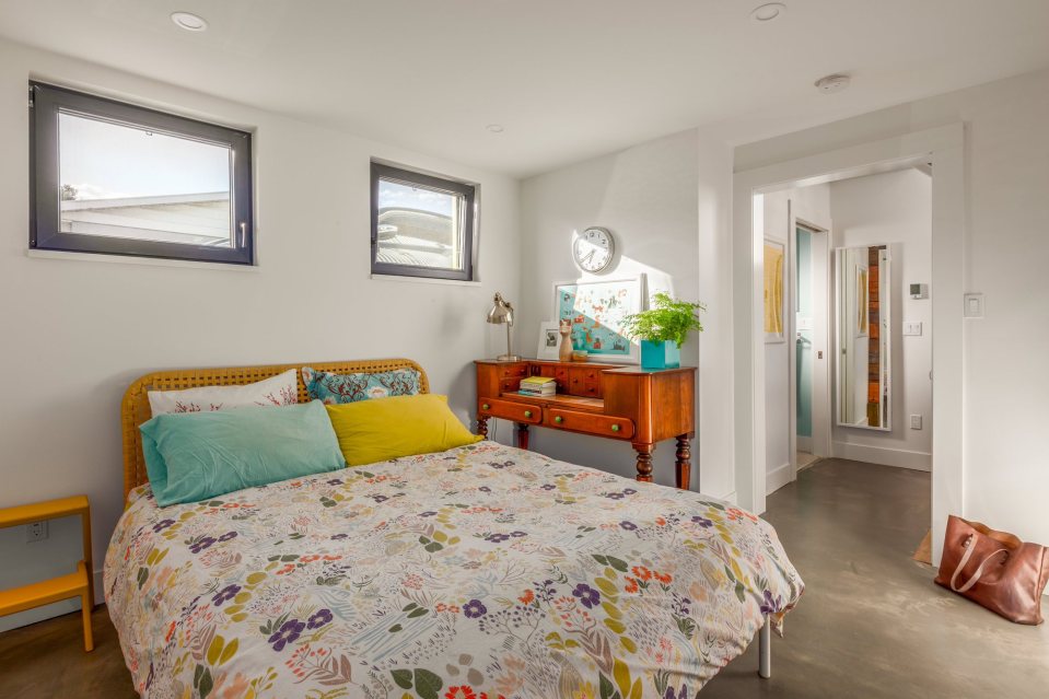 The owner's personality shines through in this Vancouver laneway house. It has one bedroom and an office loft in 760 sq ft. | www.facebook.com/SmallHouseBliss