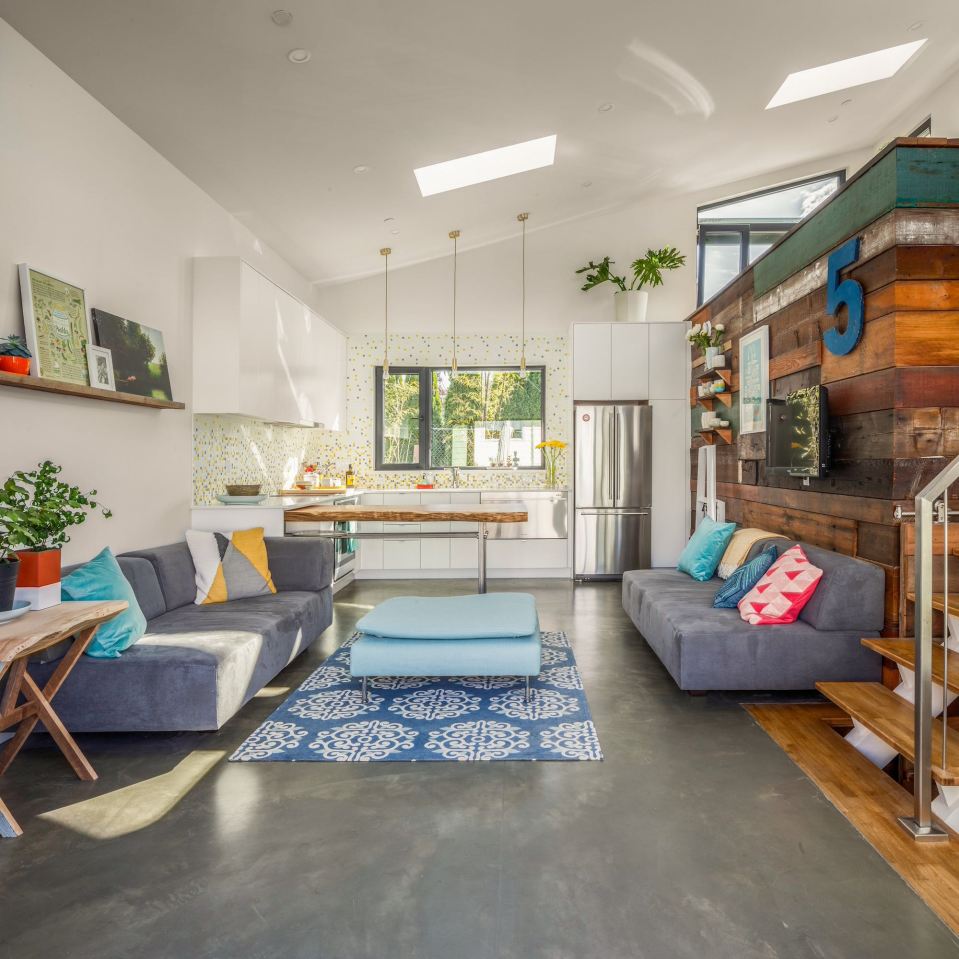 The owner's personality shines through in this Vancouver laneway house. It has one bedroom and an office loft in 760 sq ft. | www.facebook.com/SmallHouseBliss