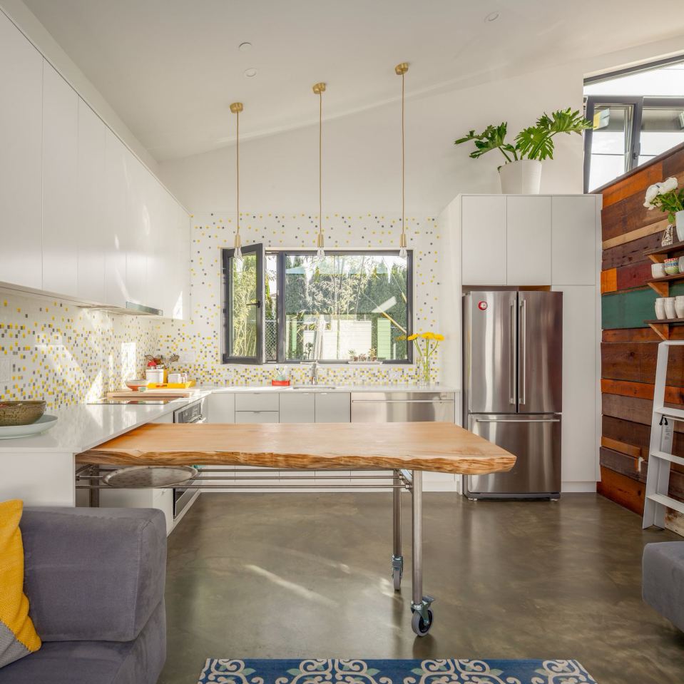 The owner's personality shines through in this Vancouver laneway house. It has one bedroom and an office loft in 760 sq ft. | www.facebook.com/SmallHouseBliss