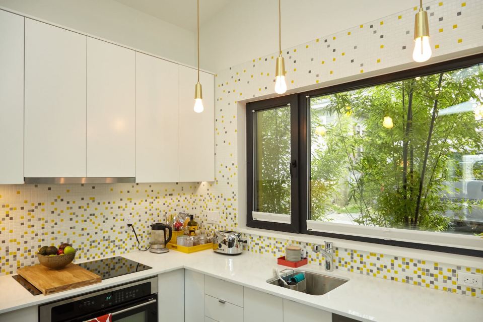 The owner's personality shines through in this Vancouver laneway house. It has one bedroom and an office loft in 760 sq ft. | www.facebook.com/SmallHouseBliss