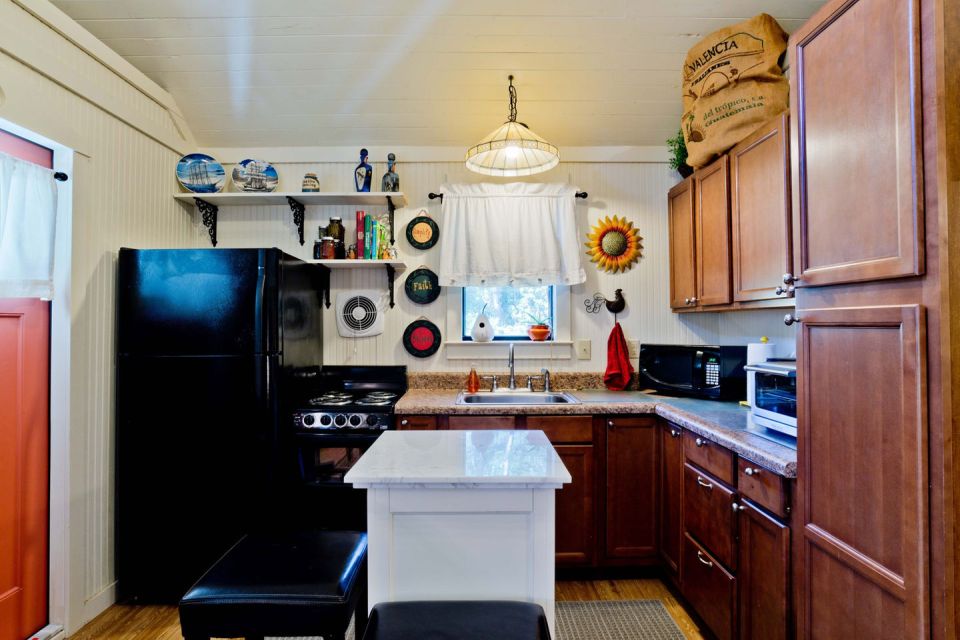 The "Tale Inn", a Southern-style one-bedroom cottage with pleasing proportions, welcoming front porch and authentic architectural details. | www.facebook.com/SmallHouseBliss