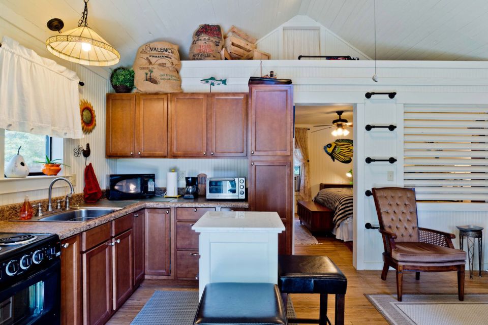 The "Tale Inn", a Southern-style one-bedroom cottage with pleasing proportions, welcoming front porch and authentic architectural details. | www.facebook.com/SmallHouseBliss